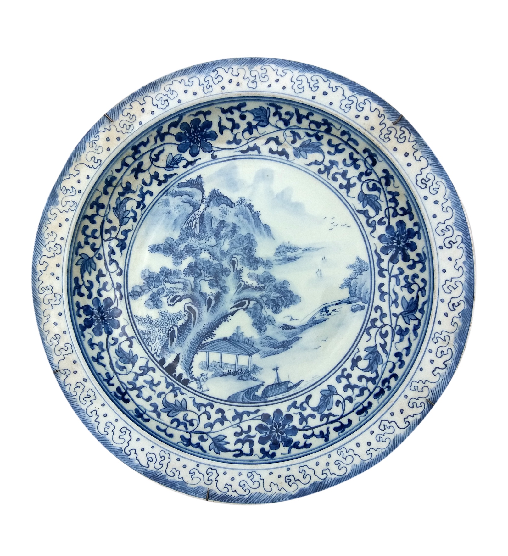 A modern Chinese blue and white basin with landscape