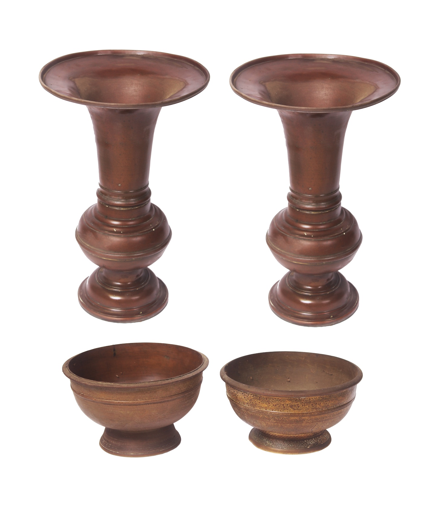 A group of four of 19th - 20th century brass consisting of two brass spittoons and two containers (bokor) with one has engraved decoration